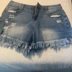 Amazon ripped, distress n washed dark denim shorts. Fringe bottom. Size medium
